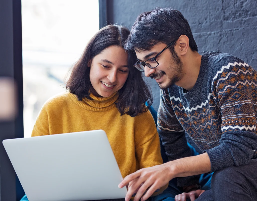 two colleagues working laptop